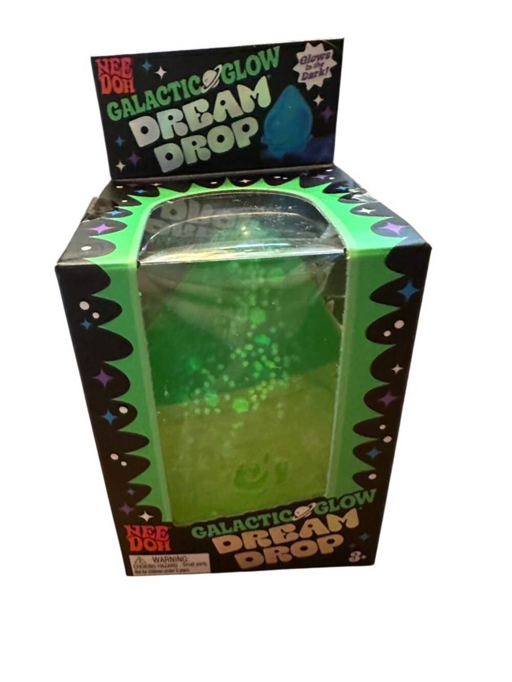 Nee Doh Galactic Glow Dream Drop Squishy Stress Toy Glows In The Dark w Stand